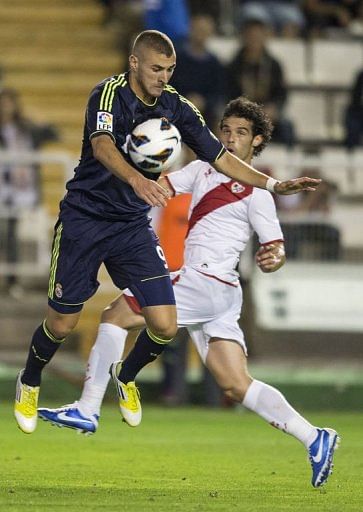 Real Madrid's Karim Benzema controls the ball